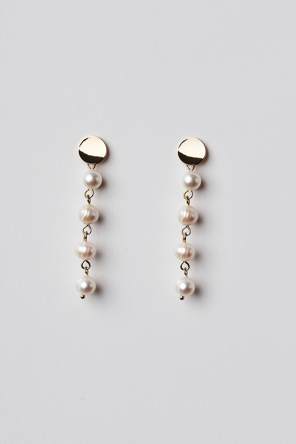 Linear pearl deals earrings